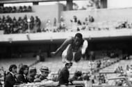 Bob Beamon giant leap at the 1968 Summer Olympics